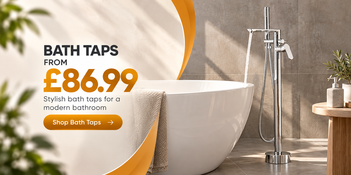 Chrome freestanding bath tap beside a modern bathtub, with bath taps from £86.99