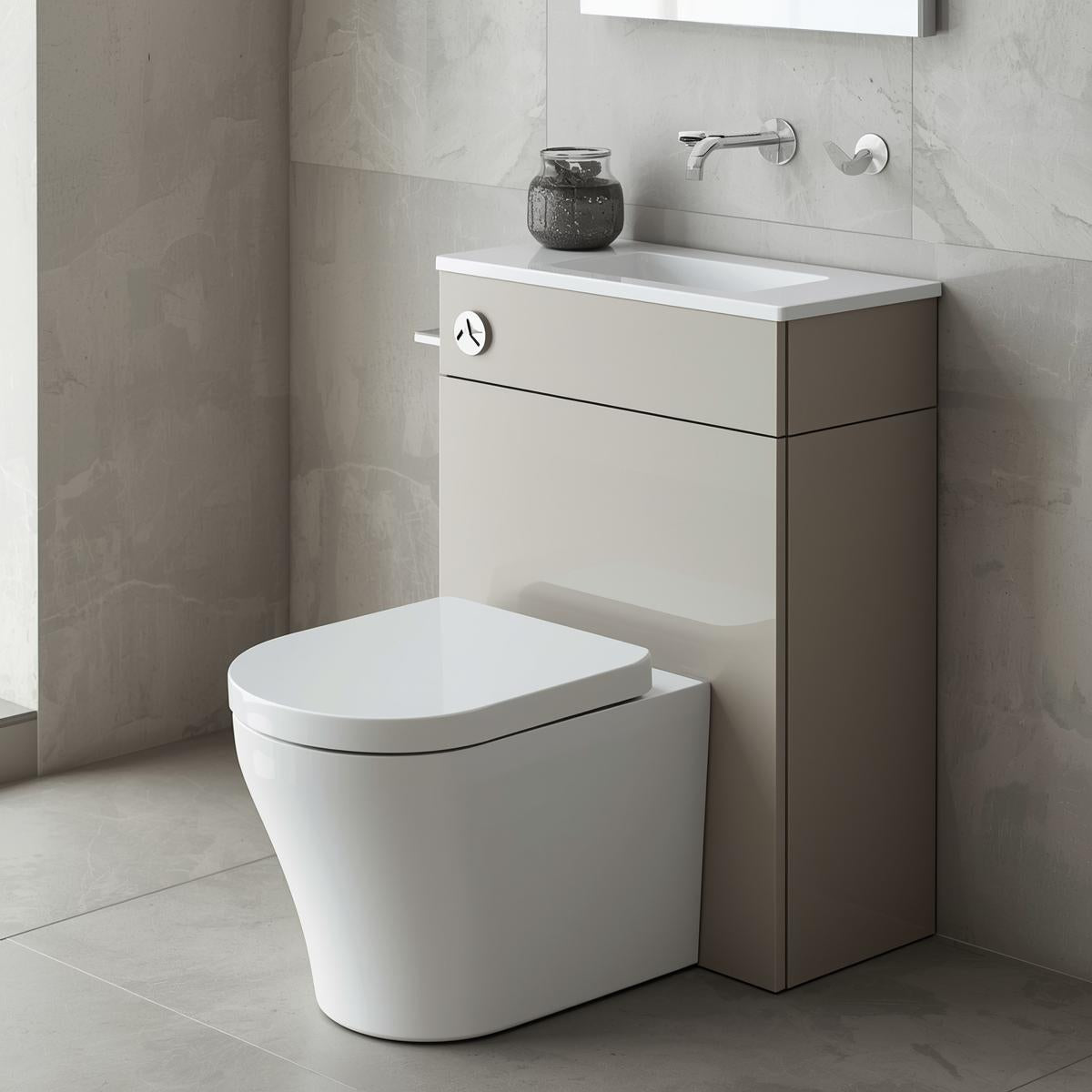 Modern bathroom with a toilet and vanity unit in a neutral color scheme.