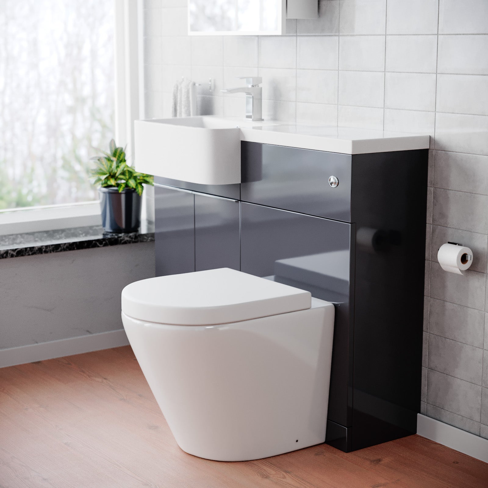 Modern bathroom with a toilet and vanity unit.