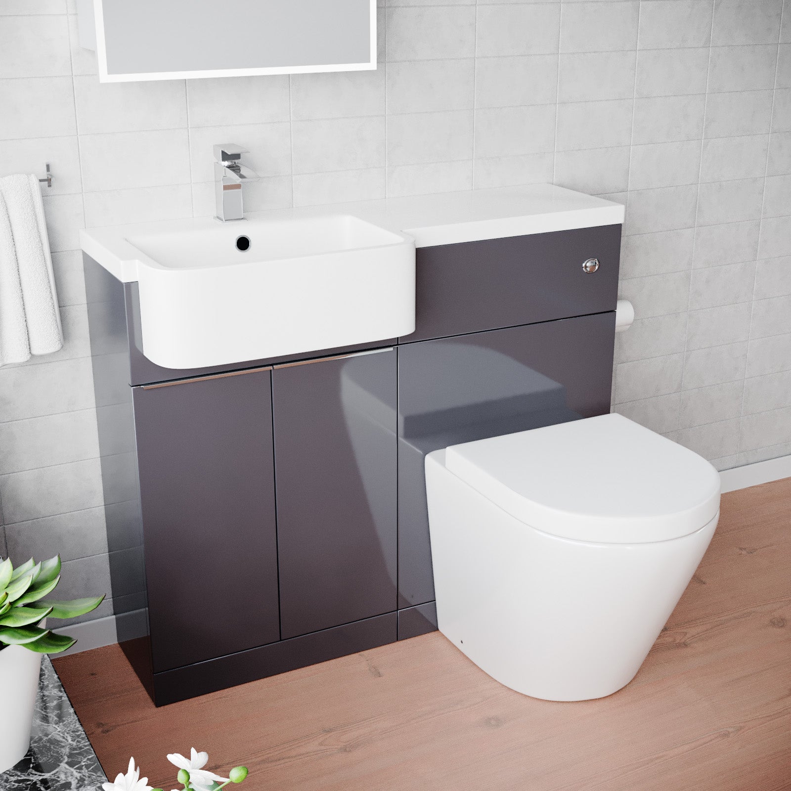 Modern bathroom setup with gray vanity, white toilet, and sink.