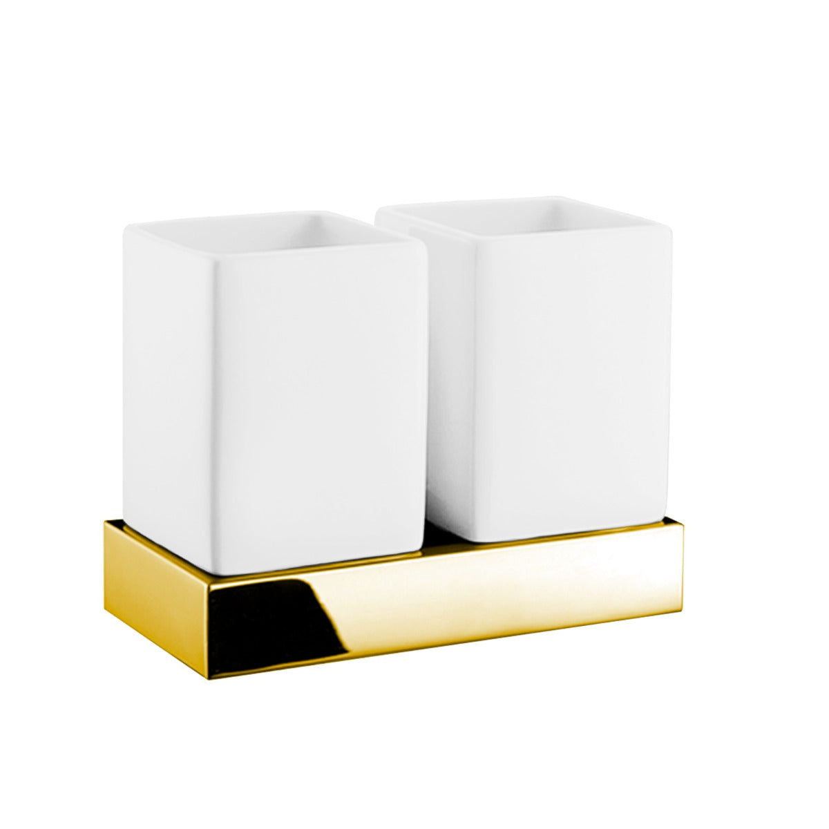 Two white ceramic cups with a gold base on a white background